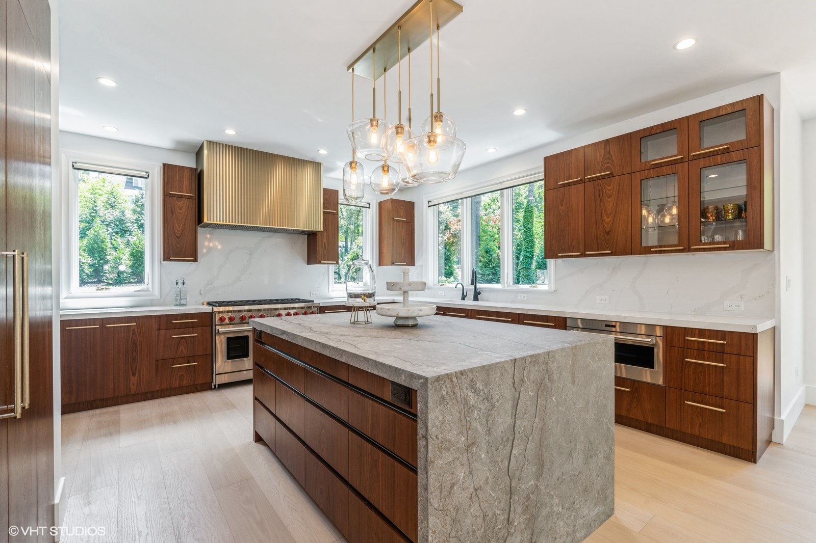 Custom stone island, countertop, and backsplash